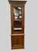 Vitrine en deux corps de style Directoire en noyer massif xx siècle