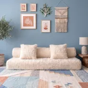 White Moroccan Arabic sofa with a rounded backrest.