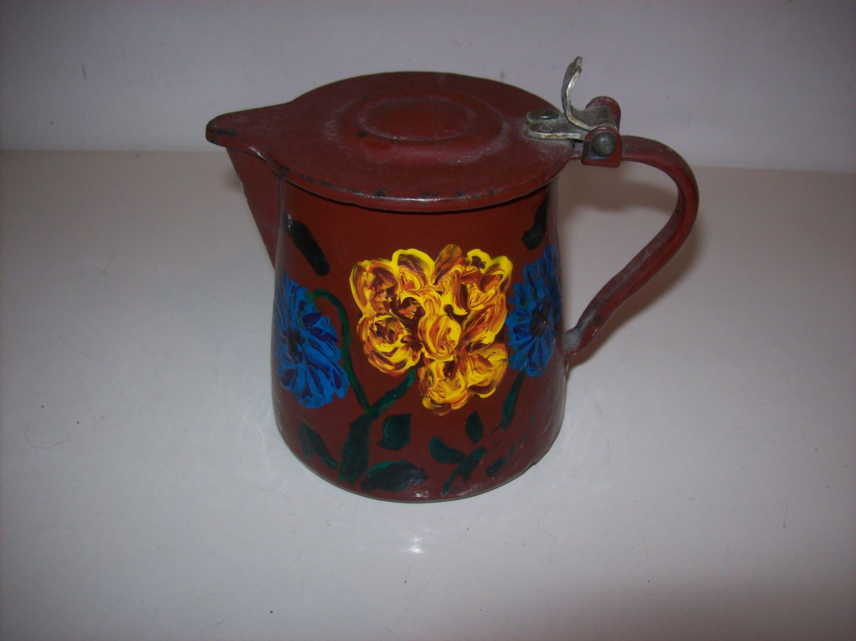 Painted enamelled teapot