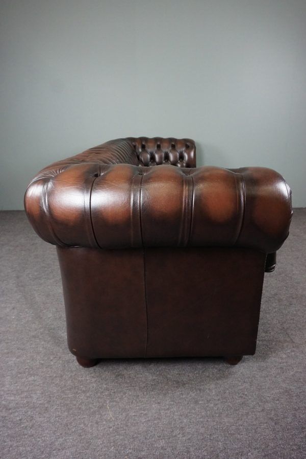 Chesterfield sofa in cowhide, 4 seats