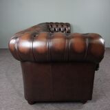 Chesterfield sofa in cowhide, 4 seats
