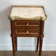 Pair of mahogany and brass side tables or bedside tables with Carrara marble tops.