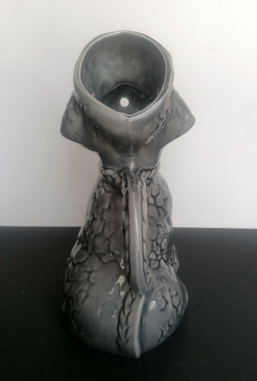 Zoomorphic pitcher slurry poodle