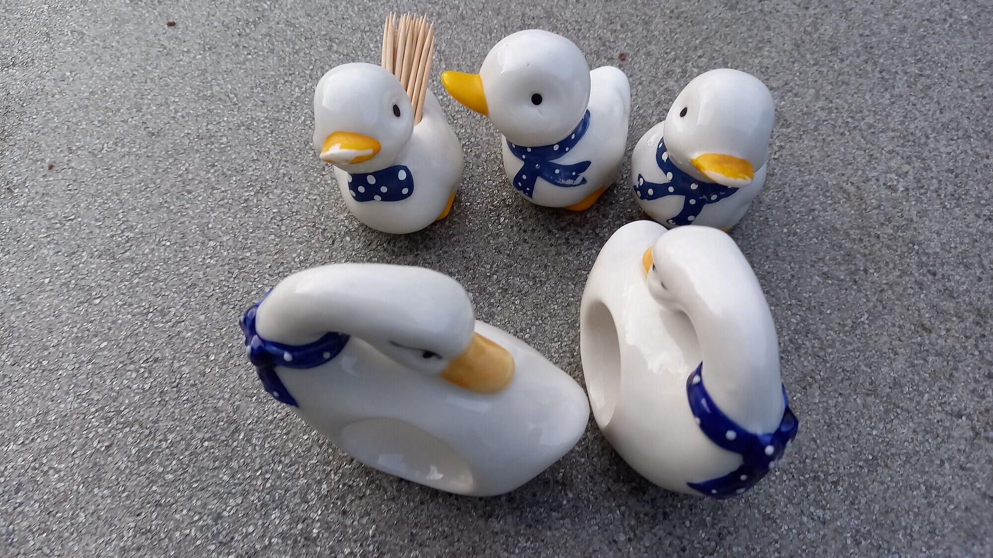 Salt shaker, pepper shaker, toothpicker, napkin rings ducks and porcelain swans