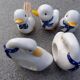 Salt shaker, pepper shaker, toothpicker, napkin rings ducks and porcelain swans