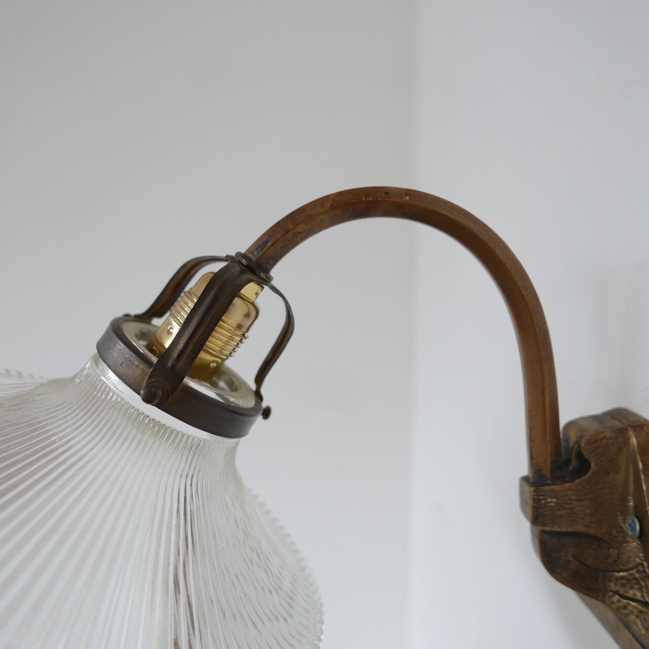 Pair of brass and glass wall sconces