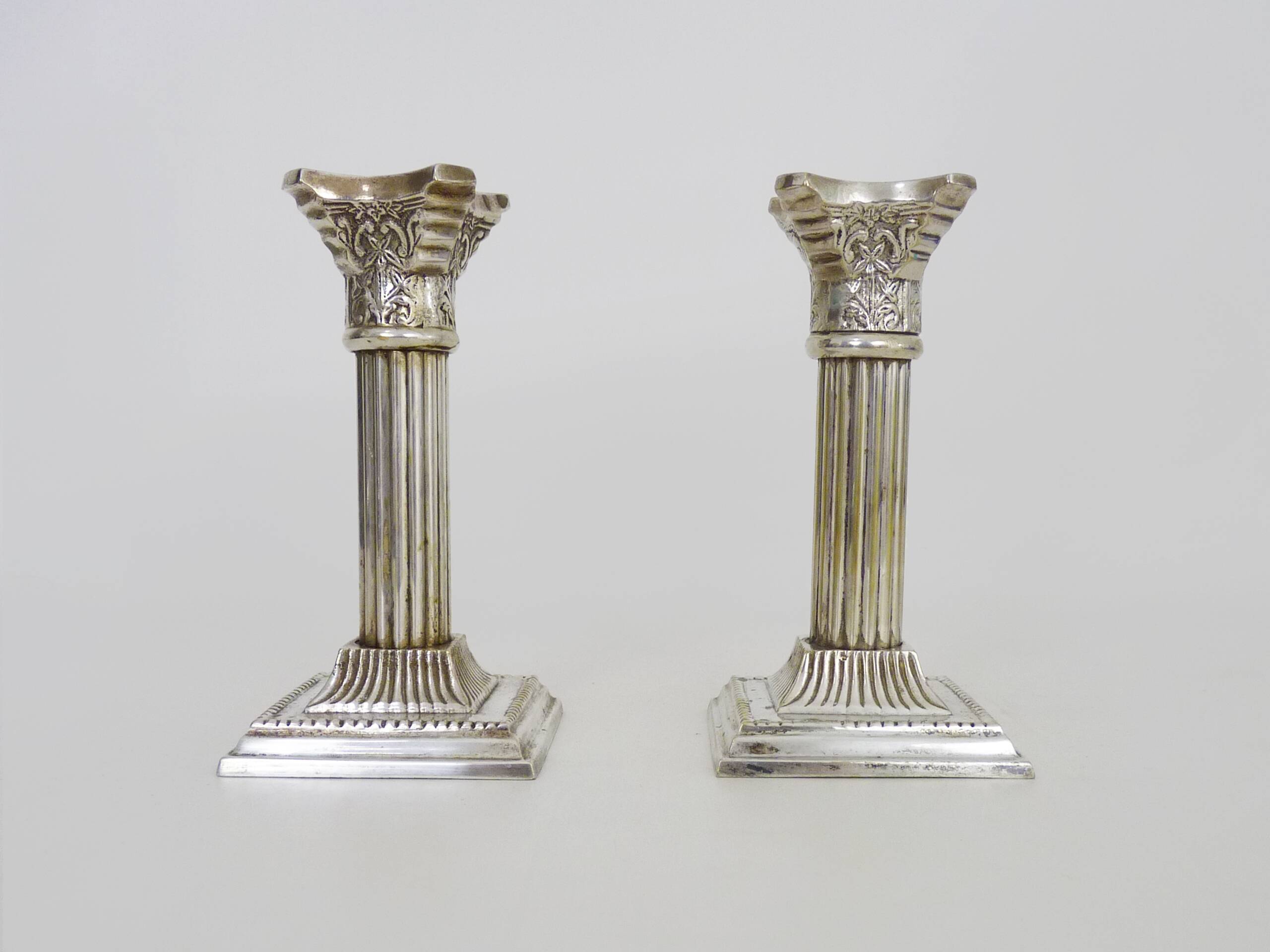 Pair of Antique Silver Plated Corinthian Candlesticks
