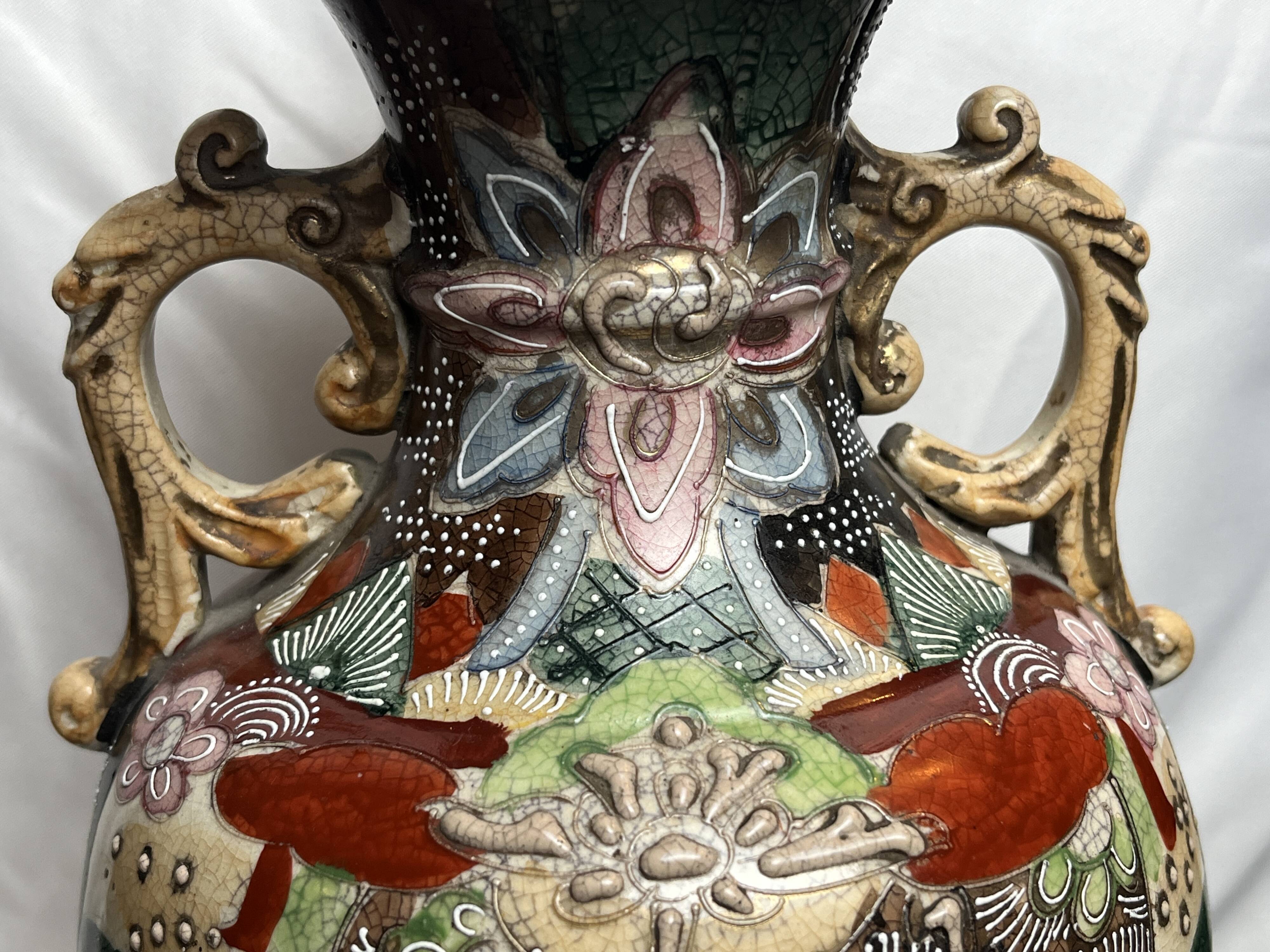 Japan, Satsuma vase with richly decorated handles, signed, early 20th century