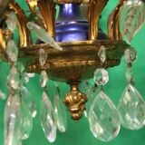 19th-century French gilt bronze chandelier featuring brass flowers and