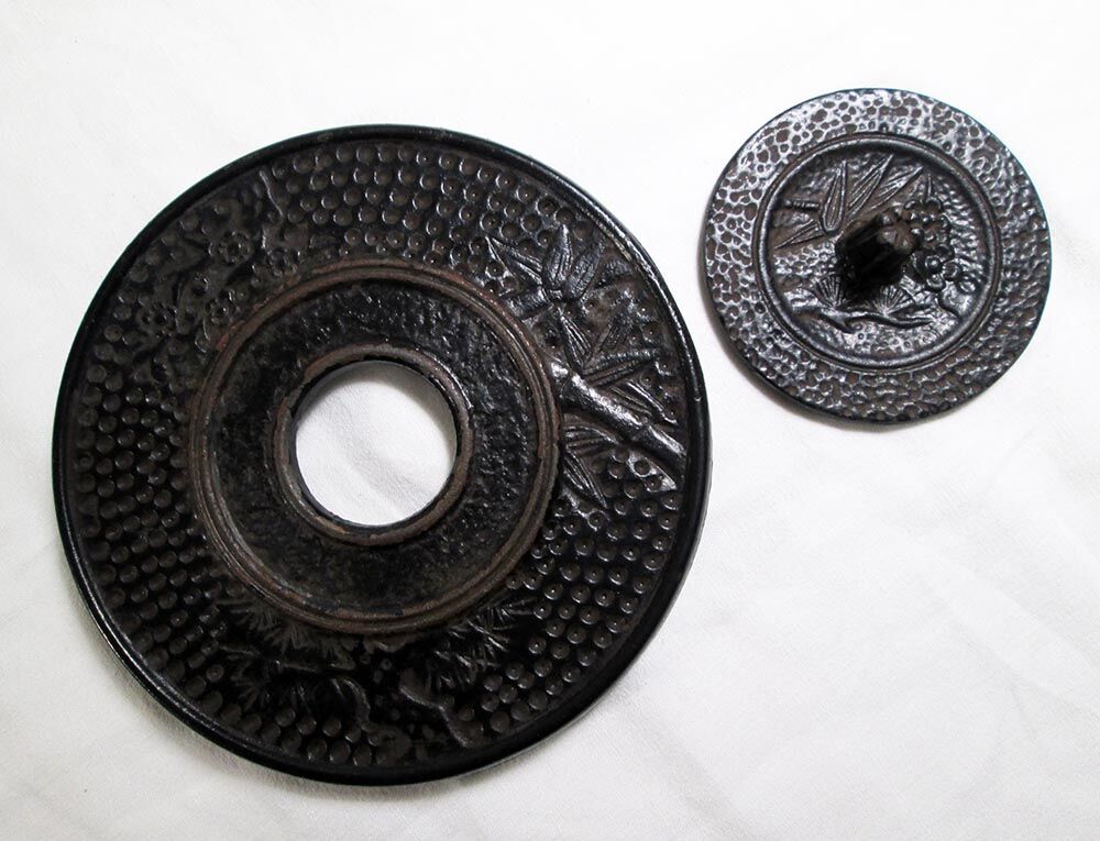 Antique cast iron teapot decorated