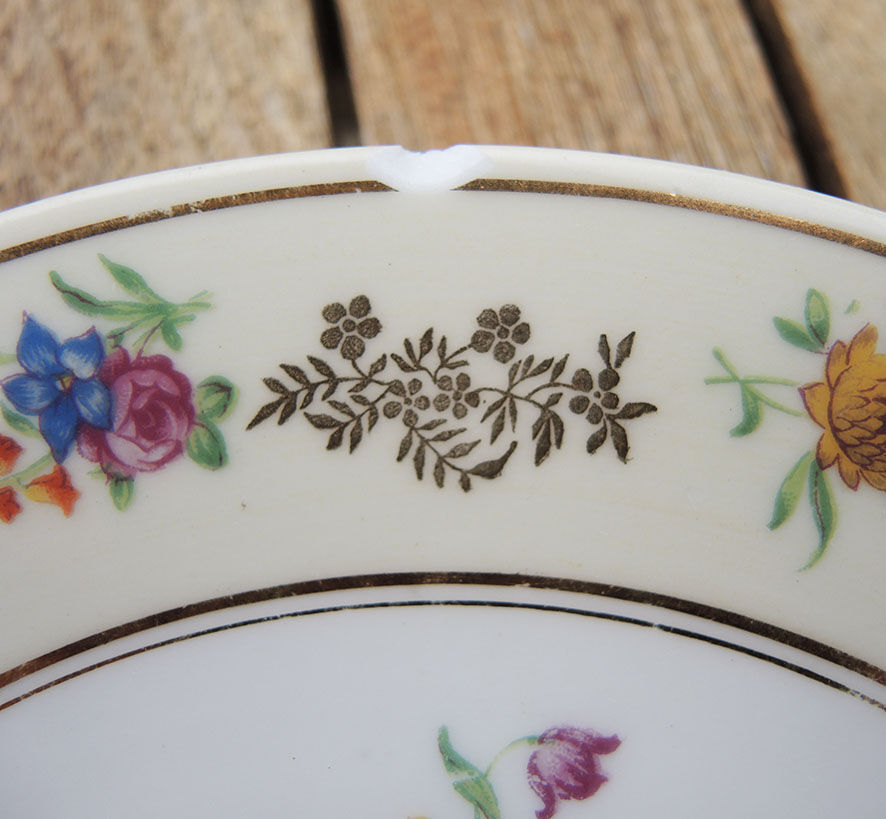 11 Limoges porcelain dessert plates, Raynaud & Co