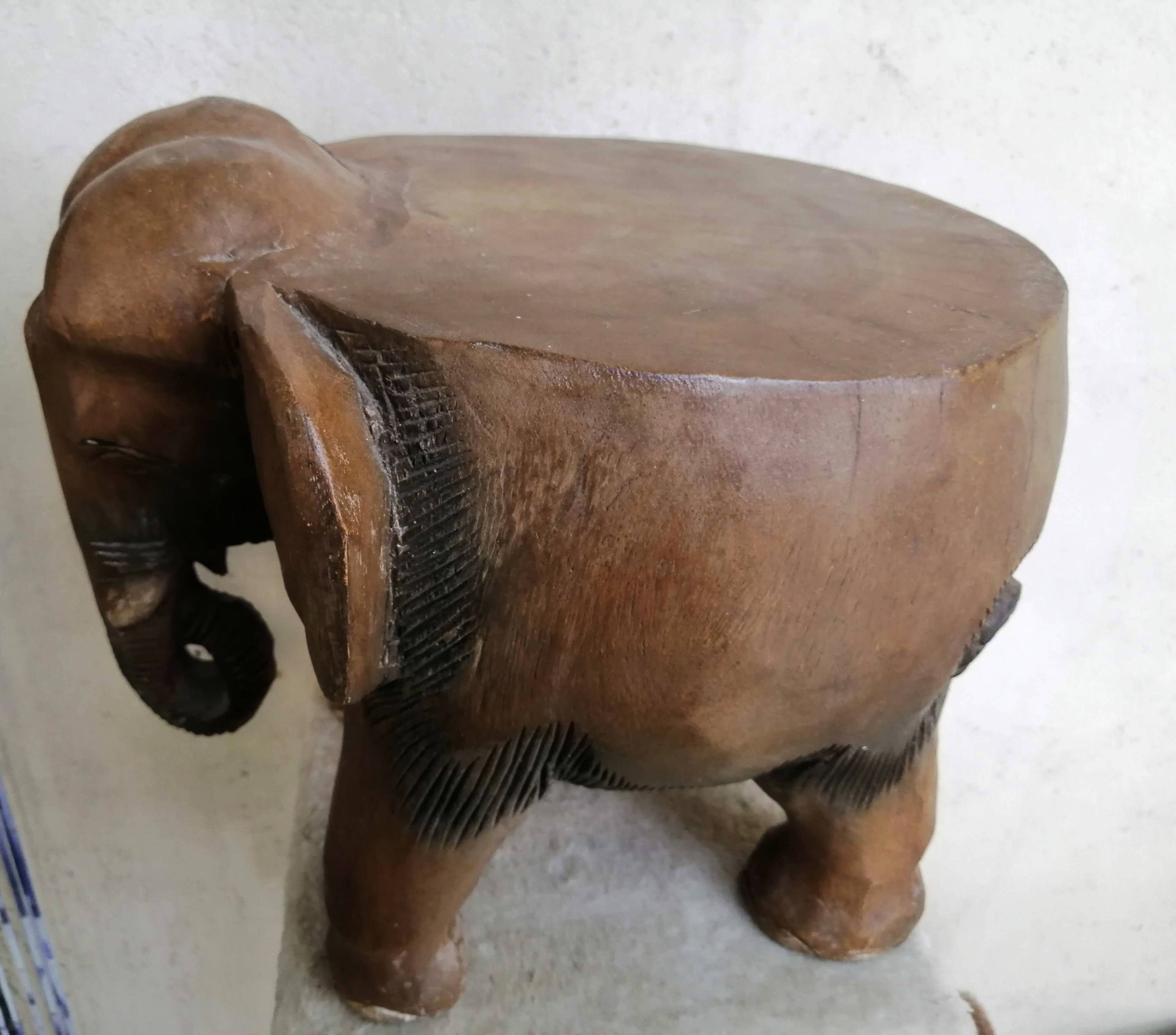 Solid wooden elephant table