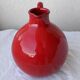 Red ceramic pitcher
