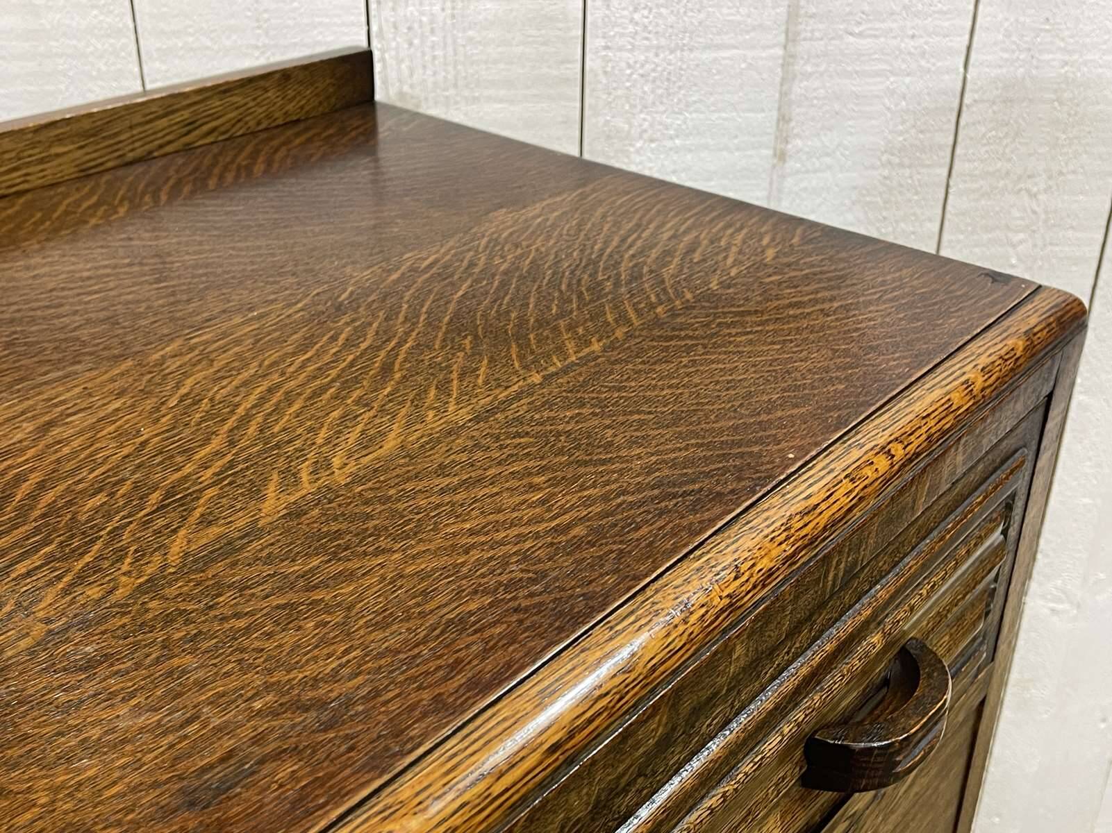 1950s English Art Deco oak chest of drawers