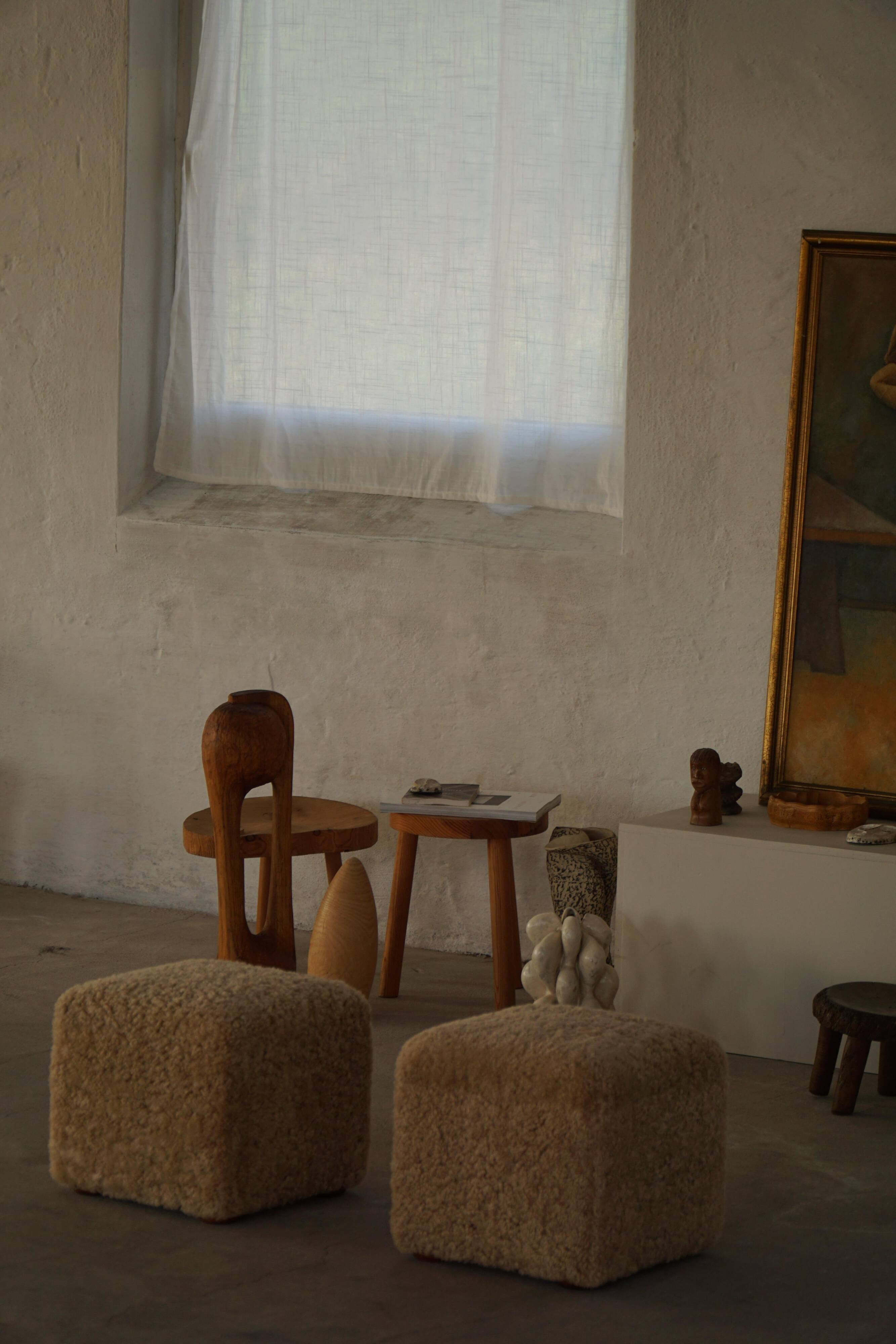 French mid-century cube poufs, a pair of lambswool stools, 1960s.
