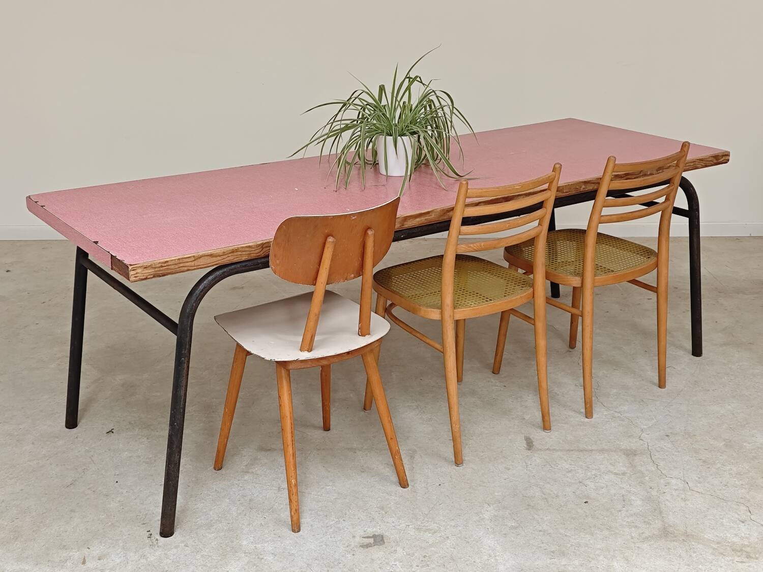 Large canteen table in pink formica and metal.