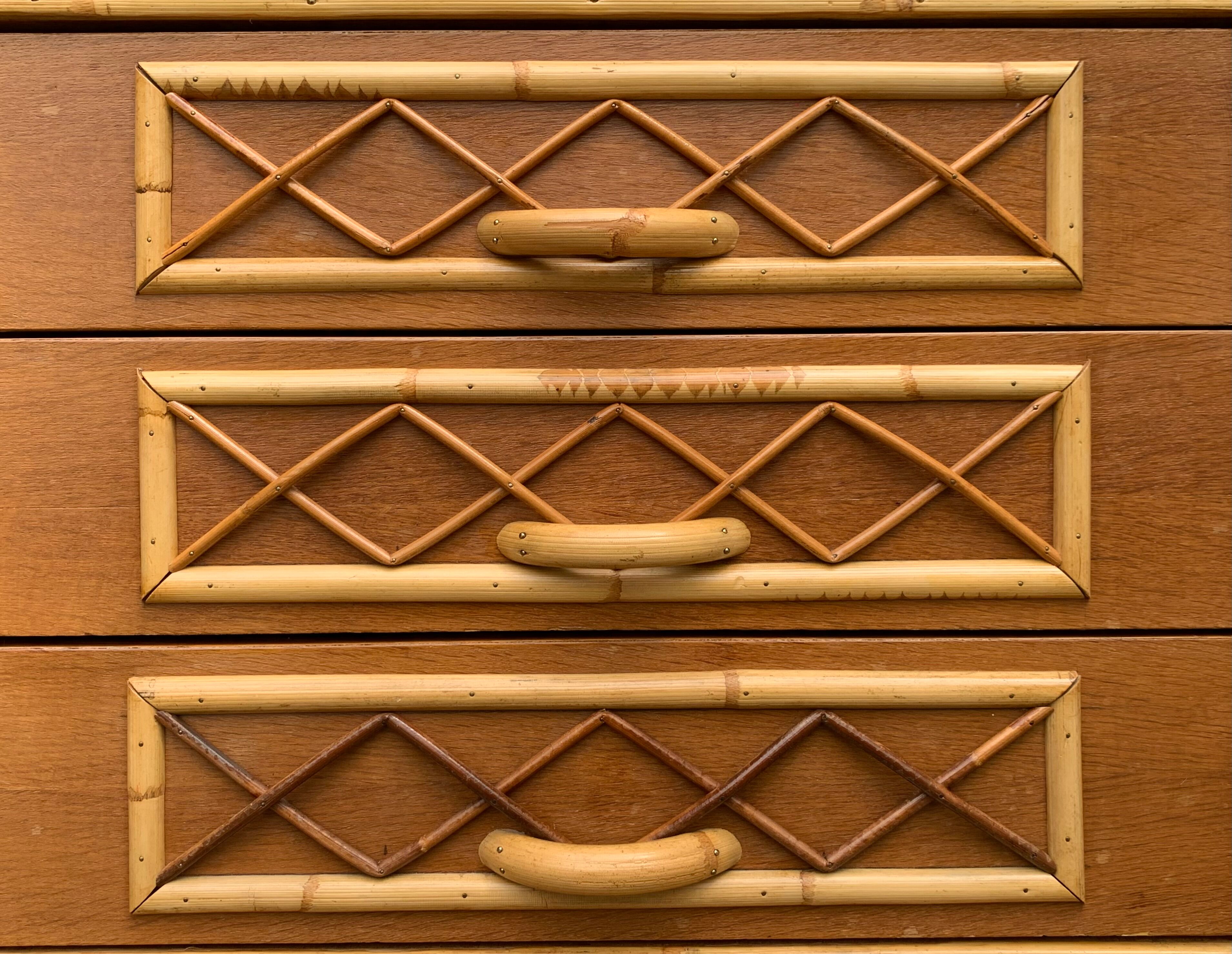 Rattan wardrobe with tapered legs from the 1960s.