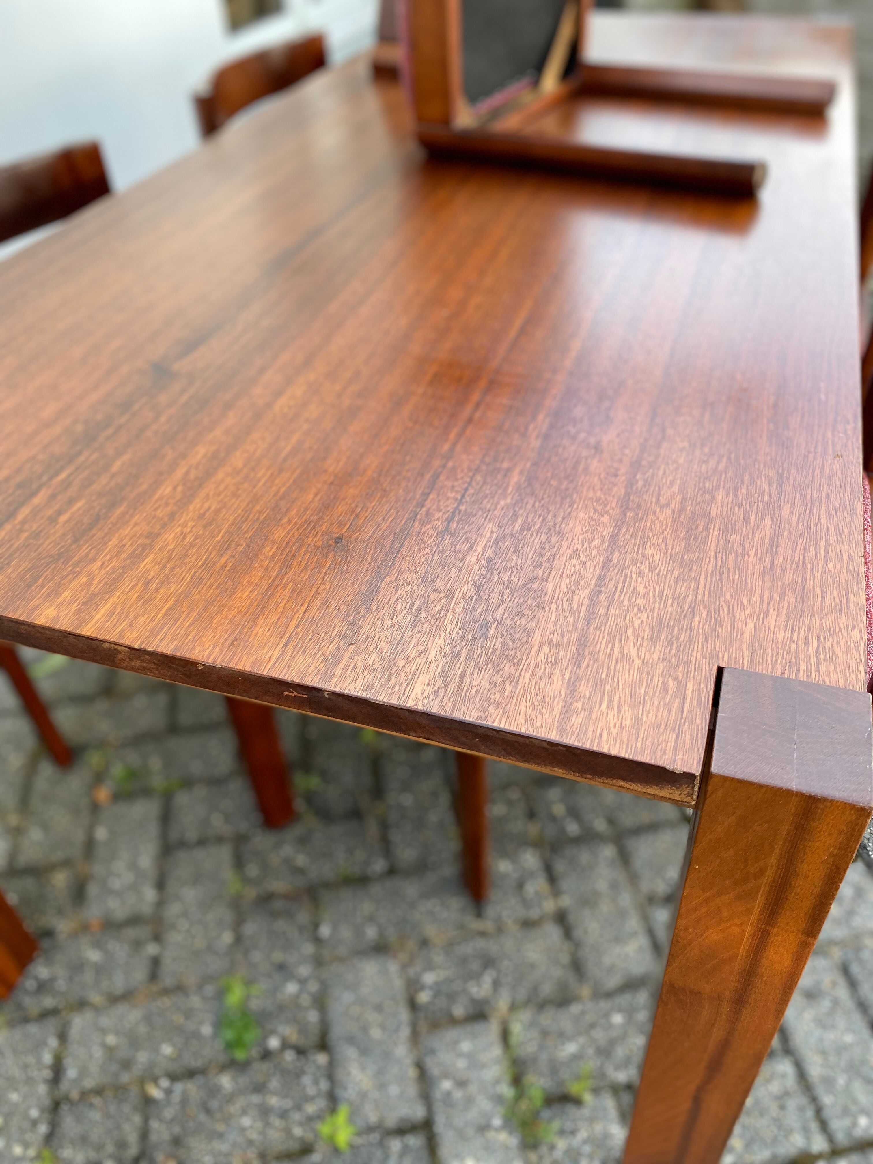 Teak wood dining table with 6 vintage rosewood chairs
