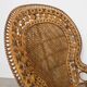 Fauteuil Paon vintage en rotin et osier — années 70