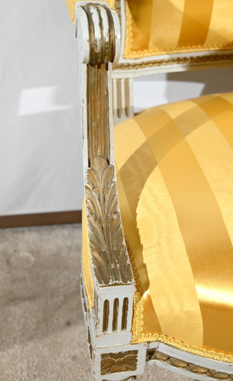 Pair of Cabriolet Armchairs, in rechampi wood, Louis XVI style – Late 19th century