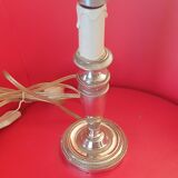 Old lamp base in silver metal.