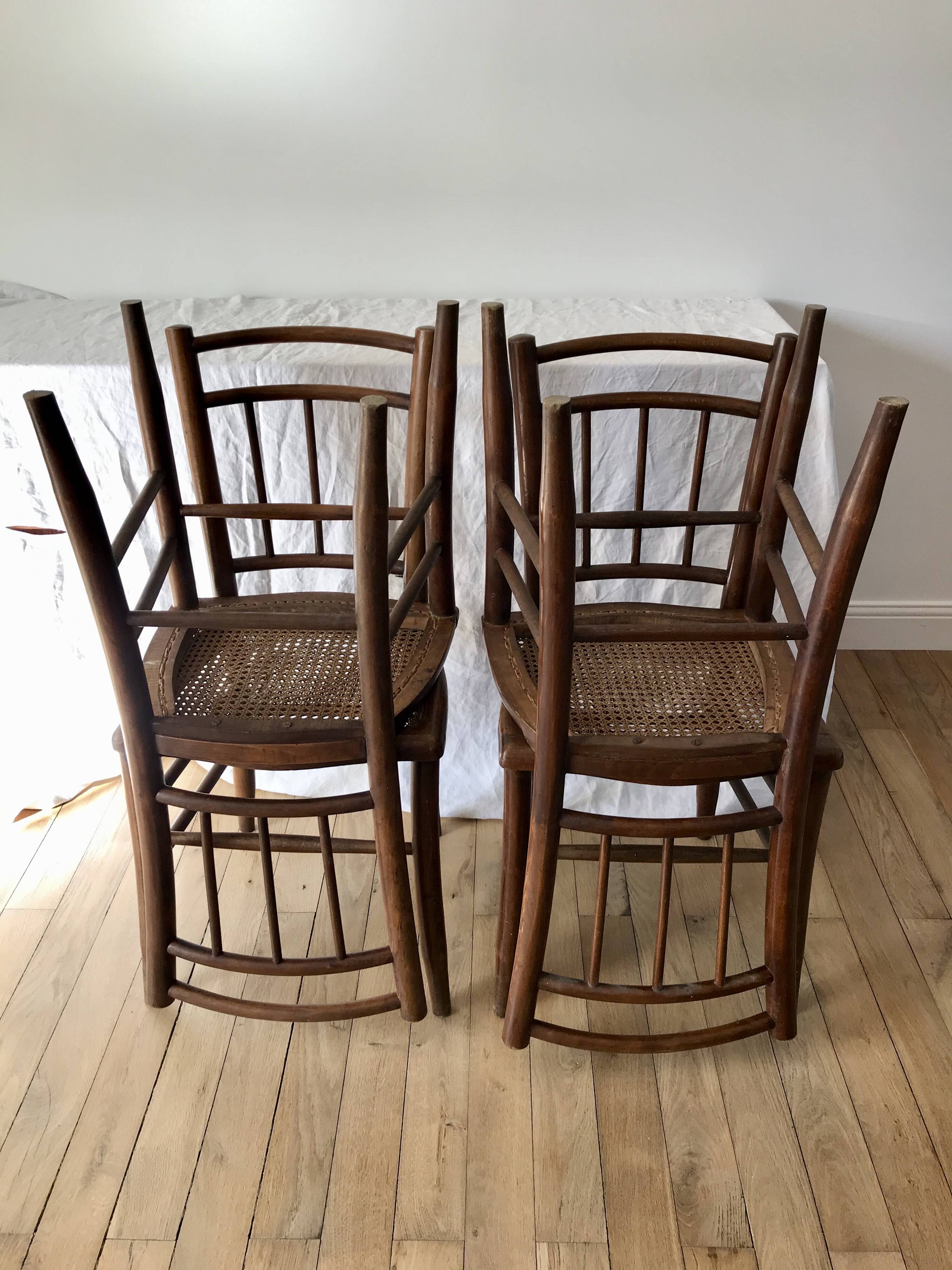 set of 4 bistro chairs in turned wood and canework stamped early 20th century