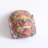 Two polychrome painted and gold leaf gilded Barong dance masks from Bali, Indonesia.
