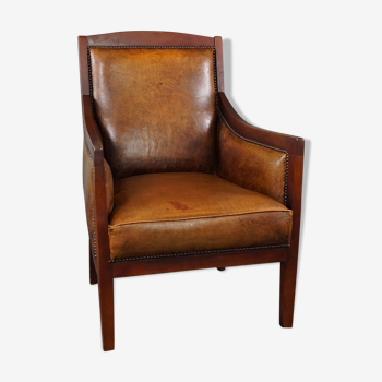 Fauteuil en cuir de mouton avec du bois