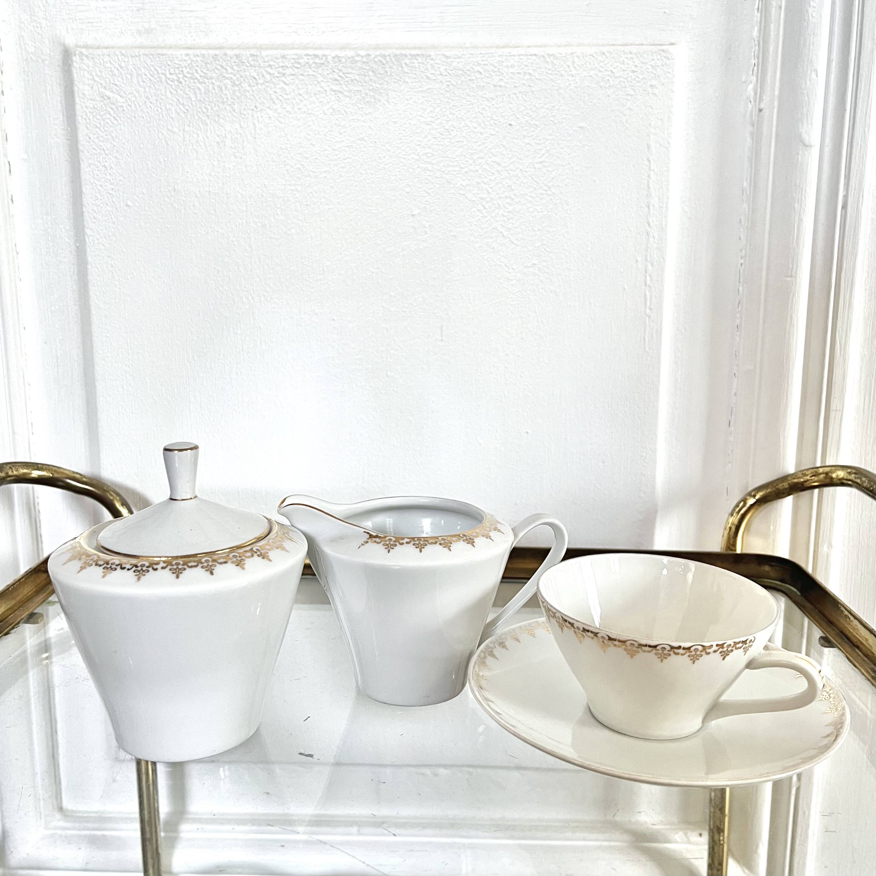 Porcelain sugar bowl and milk jug