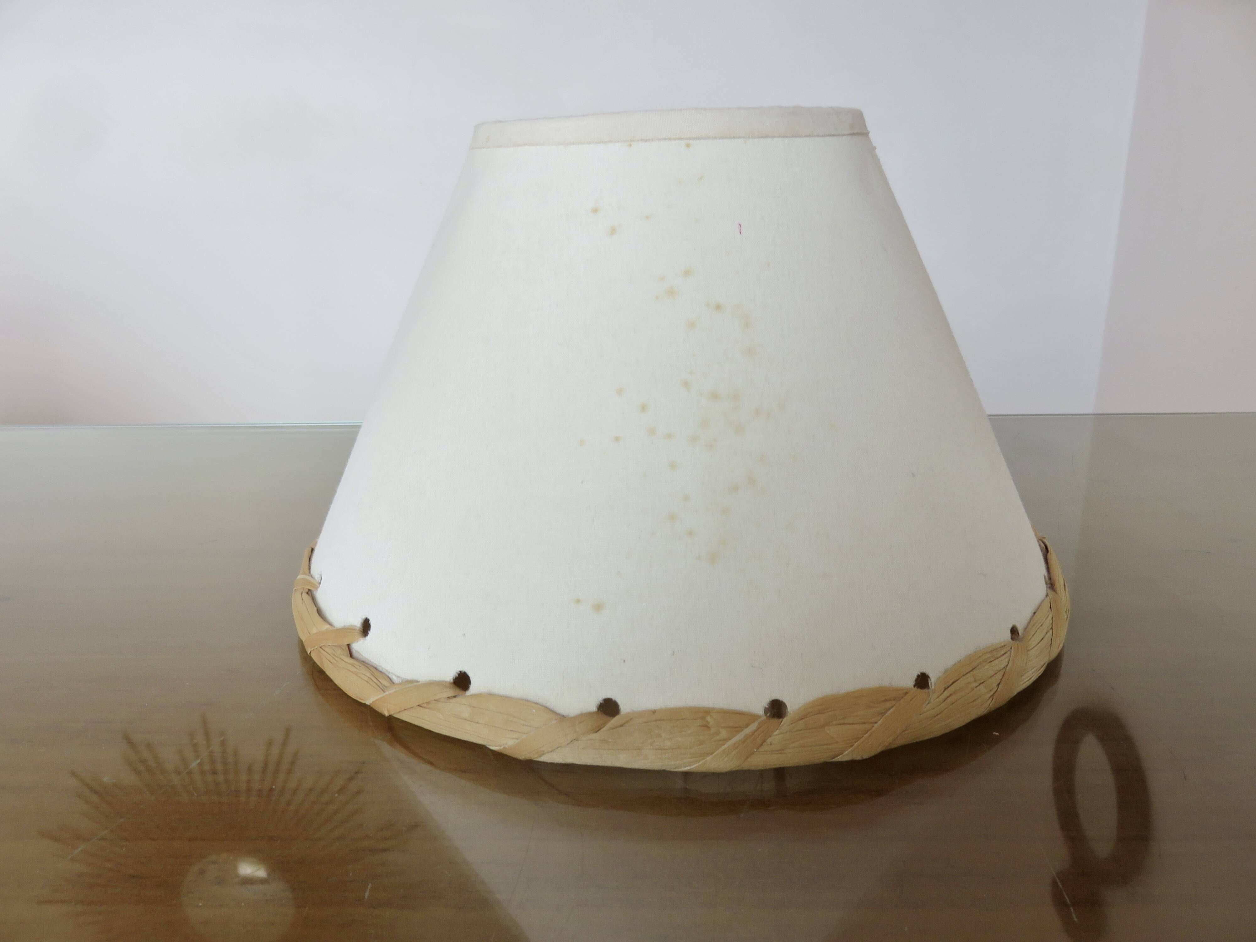 Pair of bedside lamps made of woven sea rush, matching lampshades, 1980.