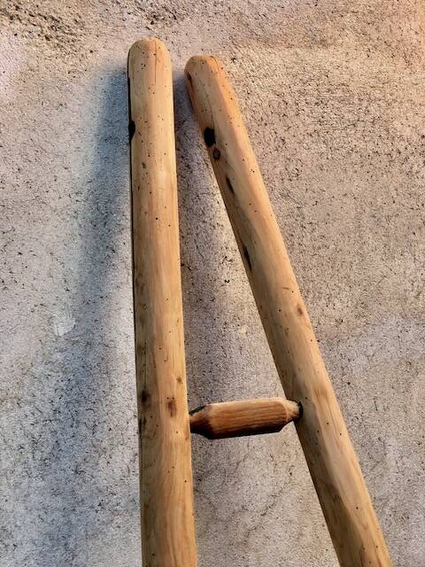 Wooden triangular ladder