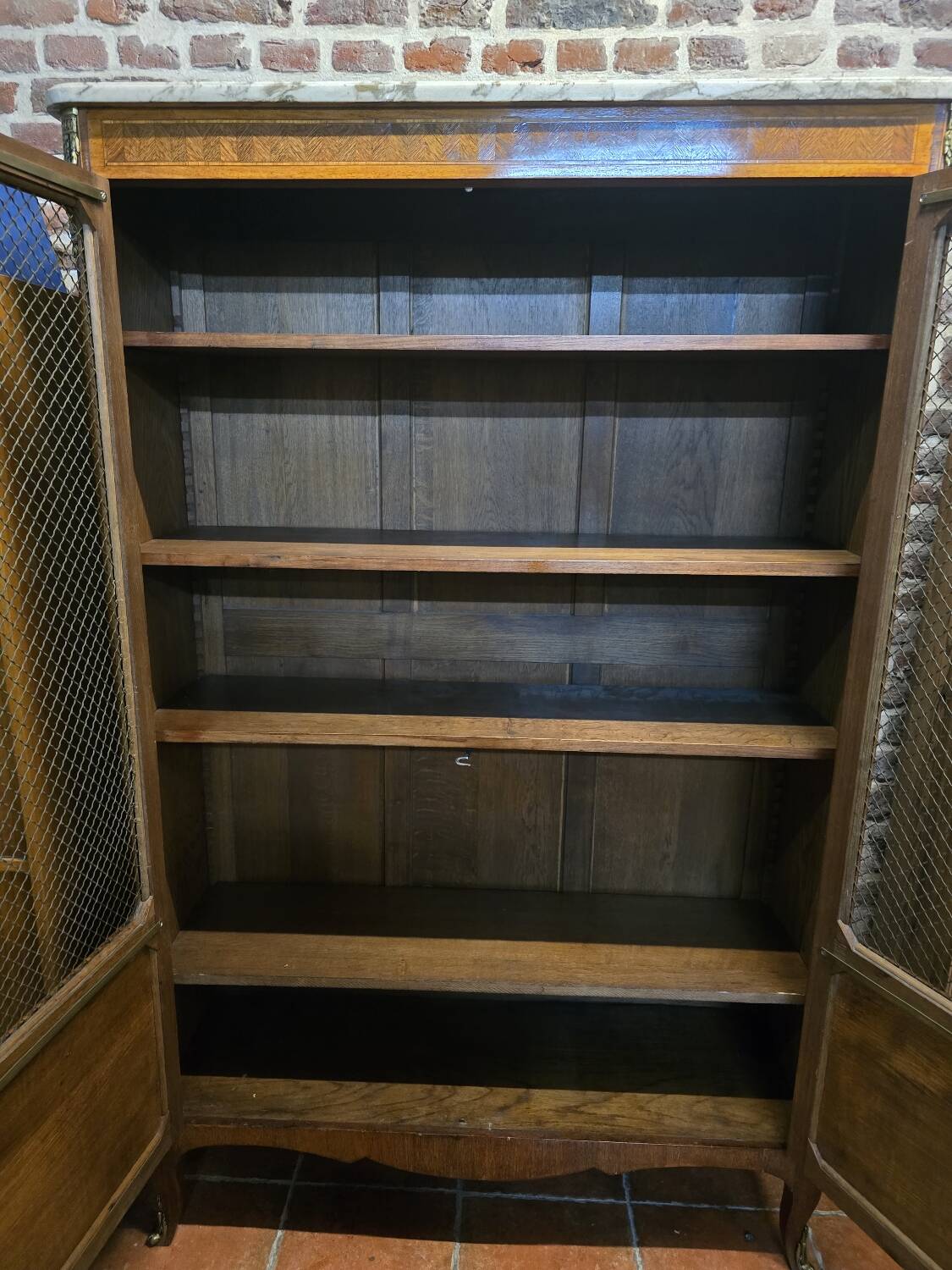 Marquetry bookcase with marble top