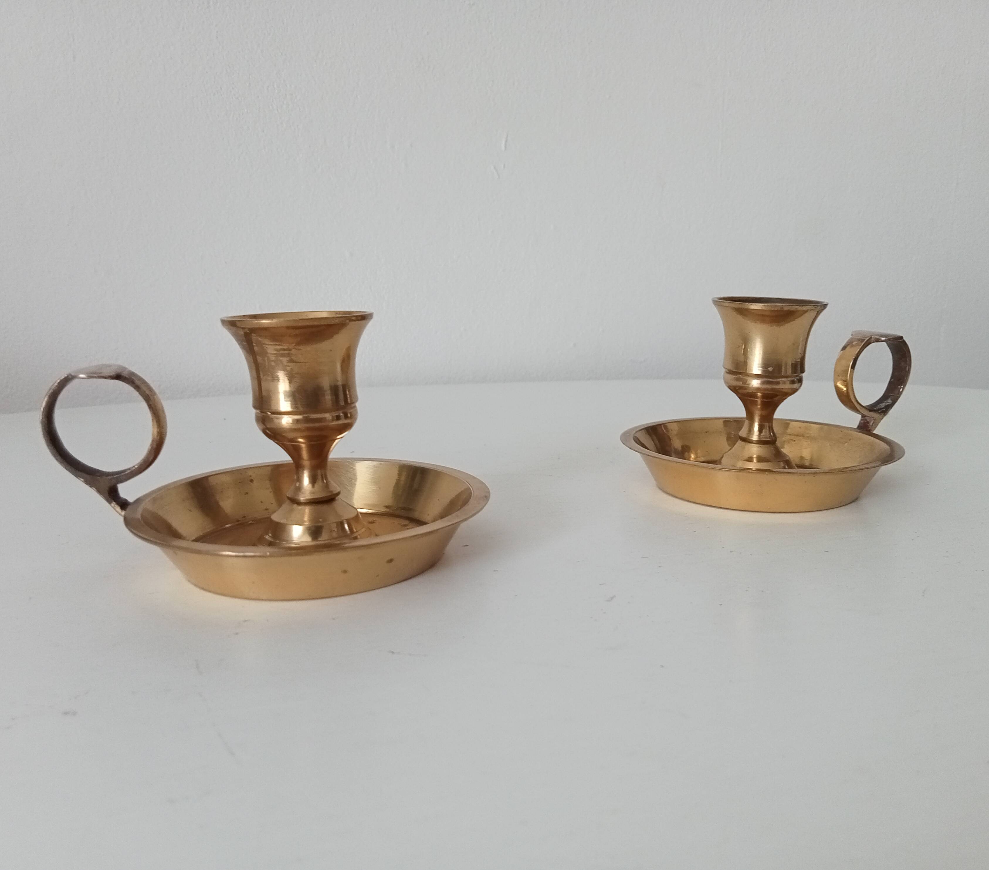 Vintage hand candle holder in solid golden brass