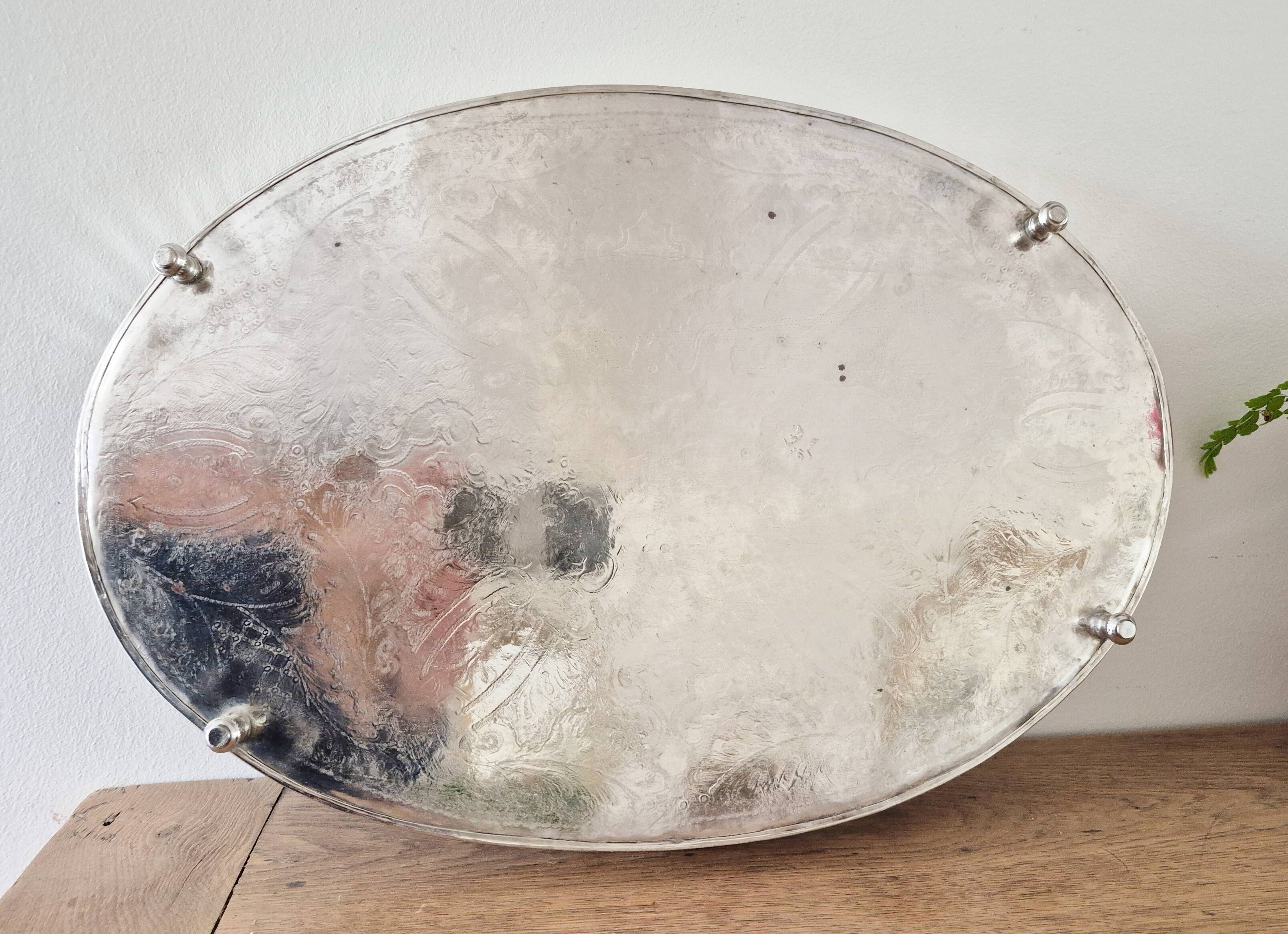 Oval silver-plated metal serving dish
