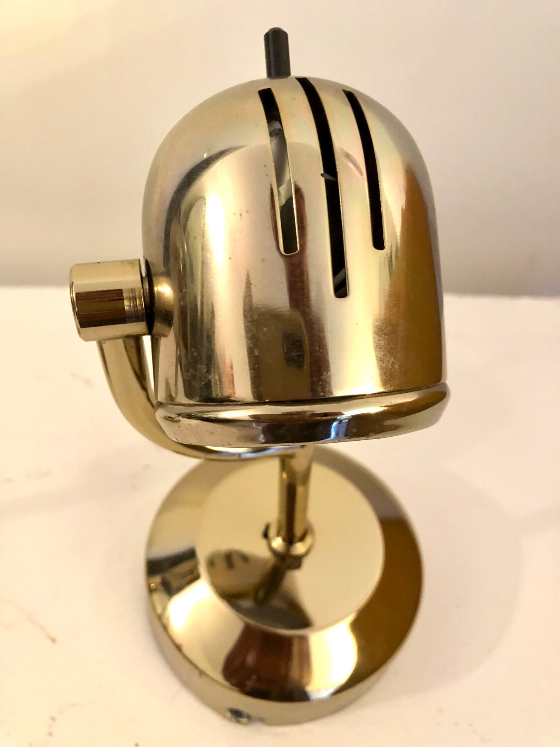Vintage Fase adjustable wall lights in gold metal.