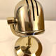 Vintage Fase adjustable wall lights in gold metal.