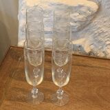 6 chiseled champagne flutes on vintage floral frieze pattern