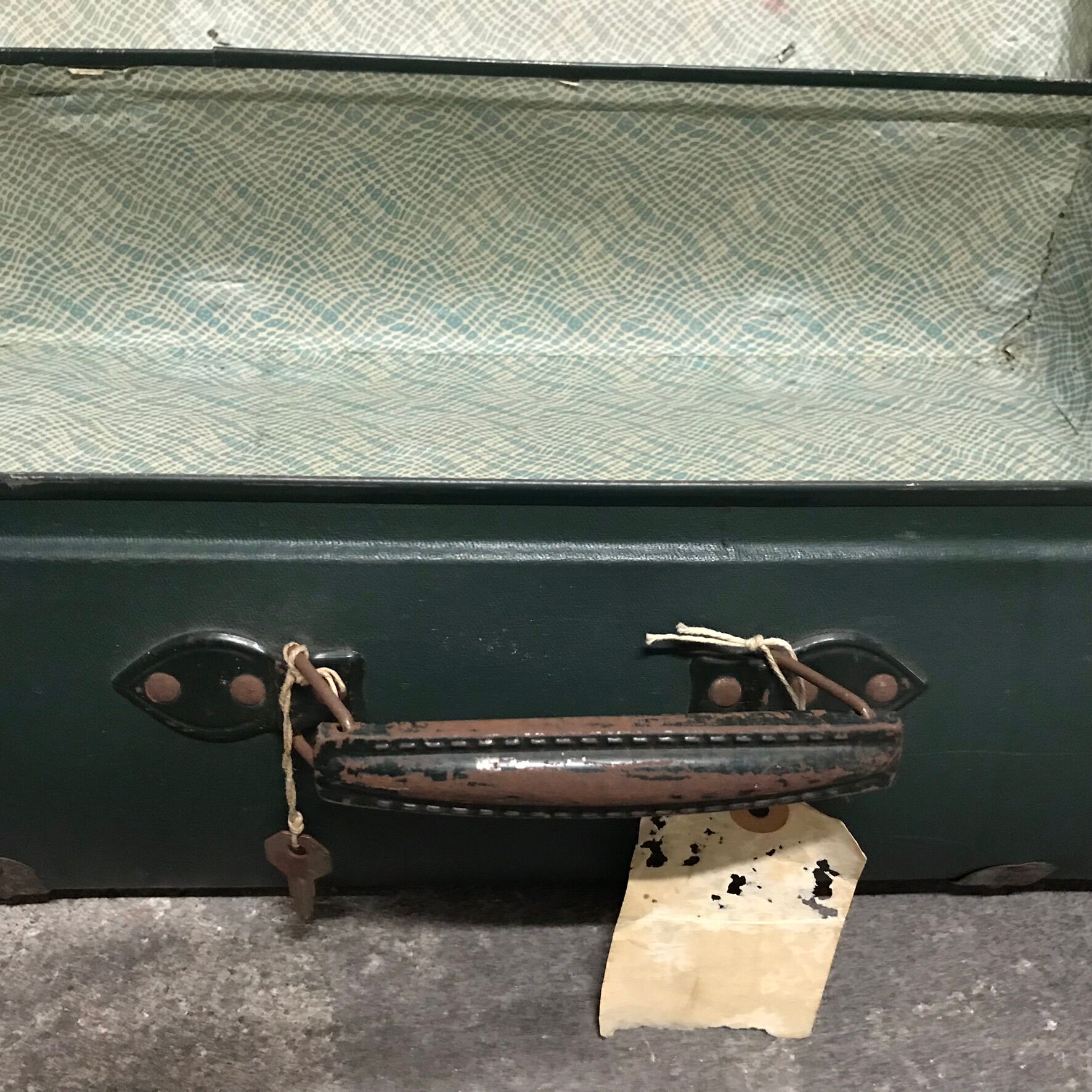 Vintage green case in vulcanized fiber