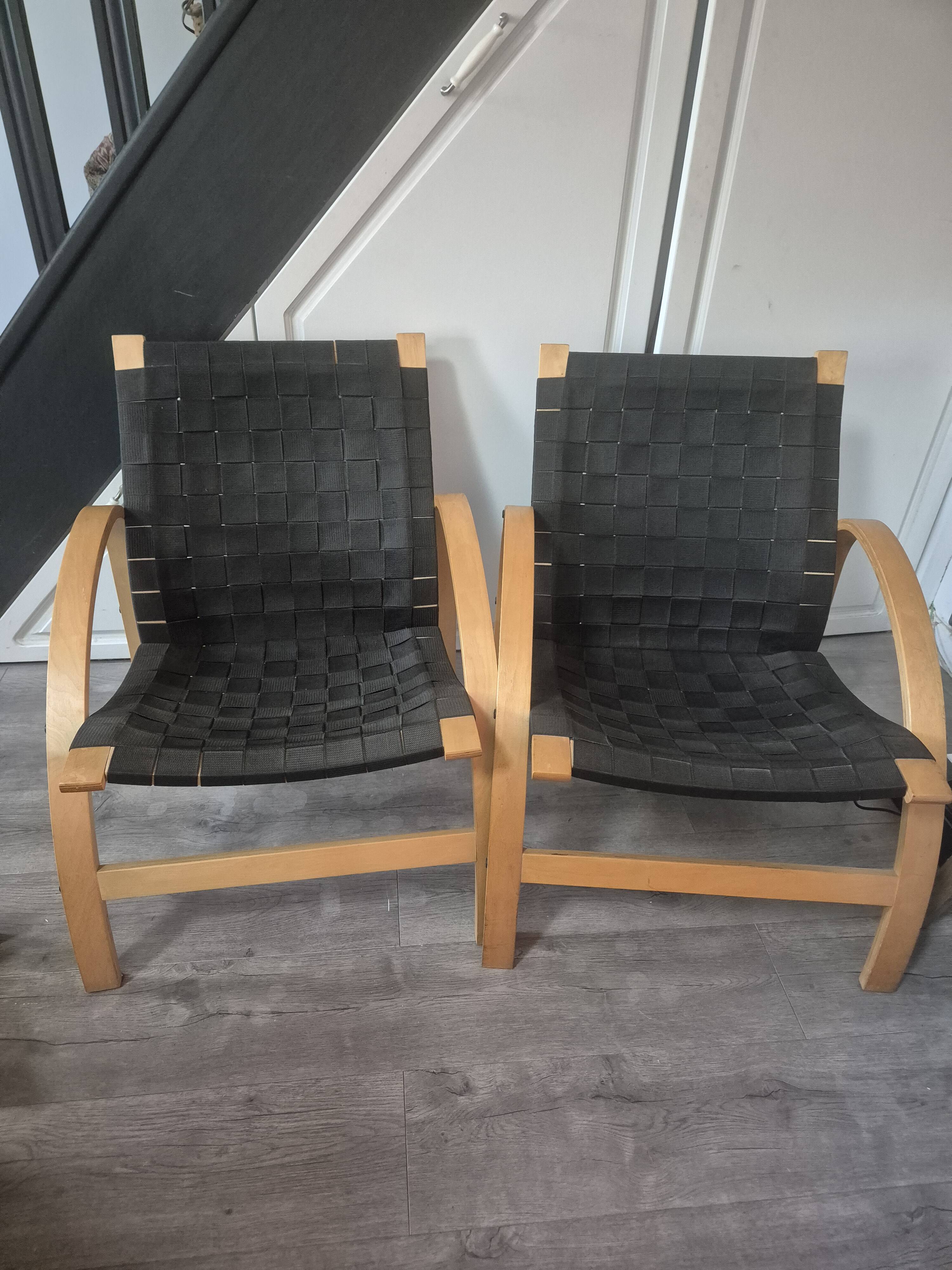 pair set of 2 armchairs with a wooden frame and black fabric weaving