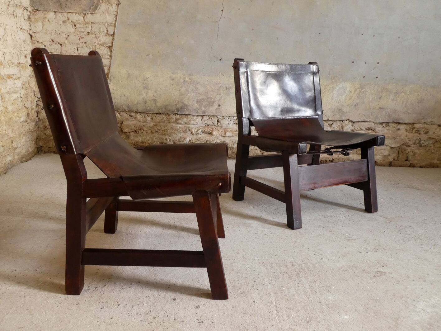 Pair of brutalist armchairs in wood and leather, 1970