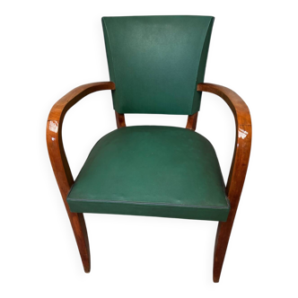 Green faux leather bridge chair