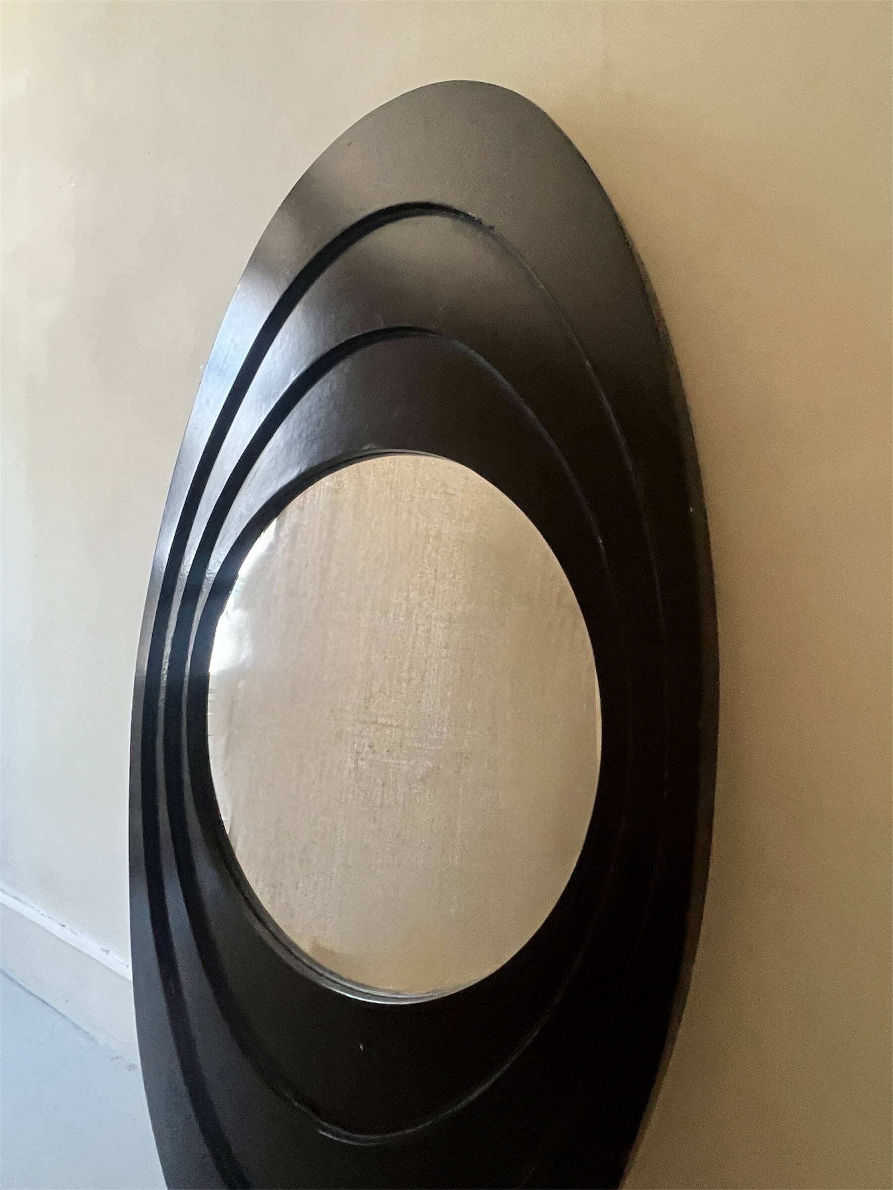 Large oval Italian mirror, modernist, space age design from the 1970s.