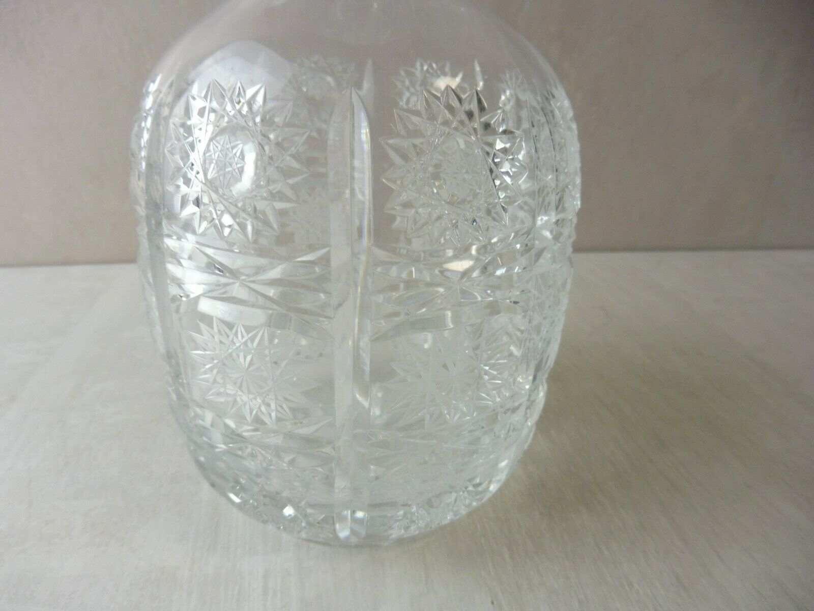 Old carved crystal decanter, star décor
