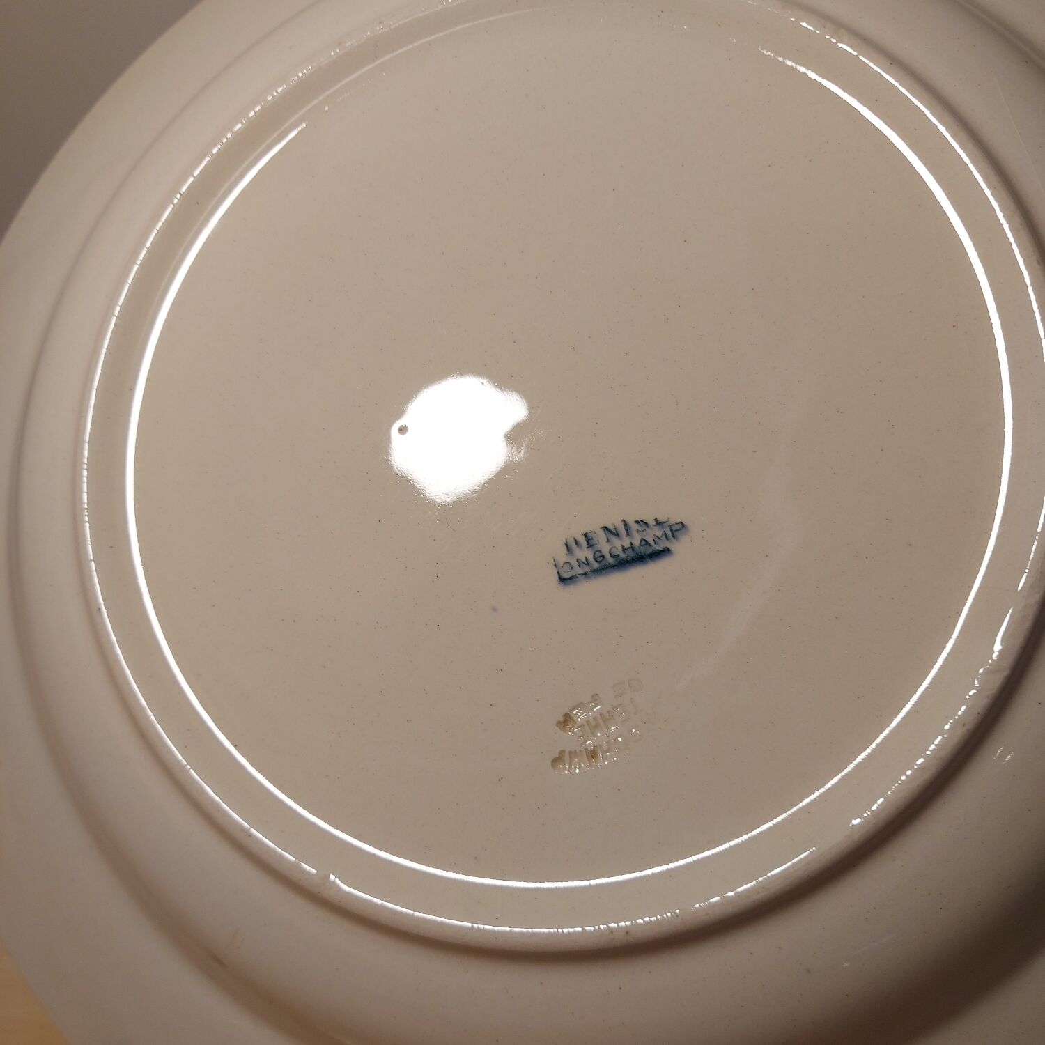 Round dish Longchamp model Denise