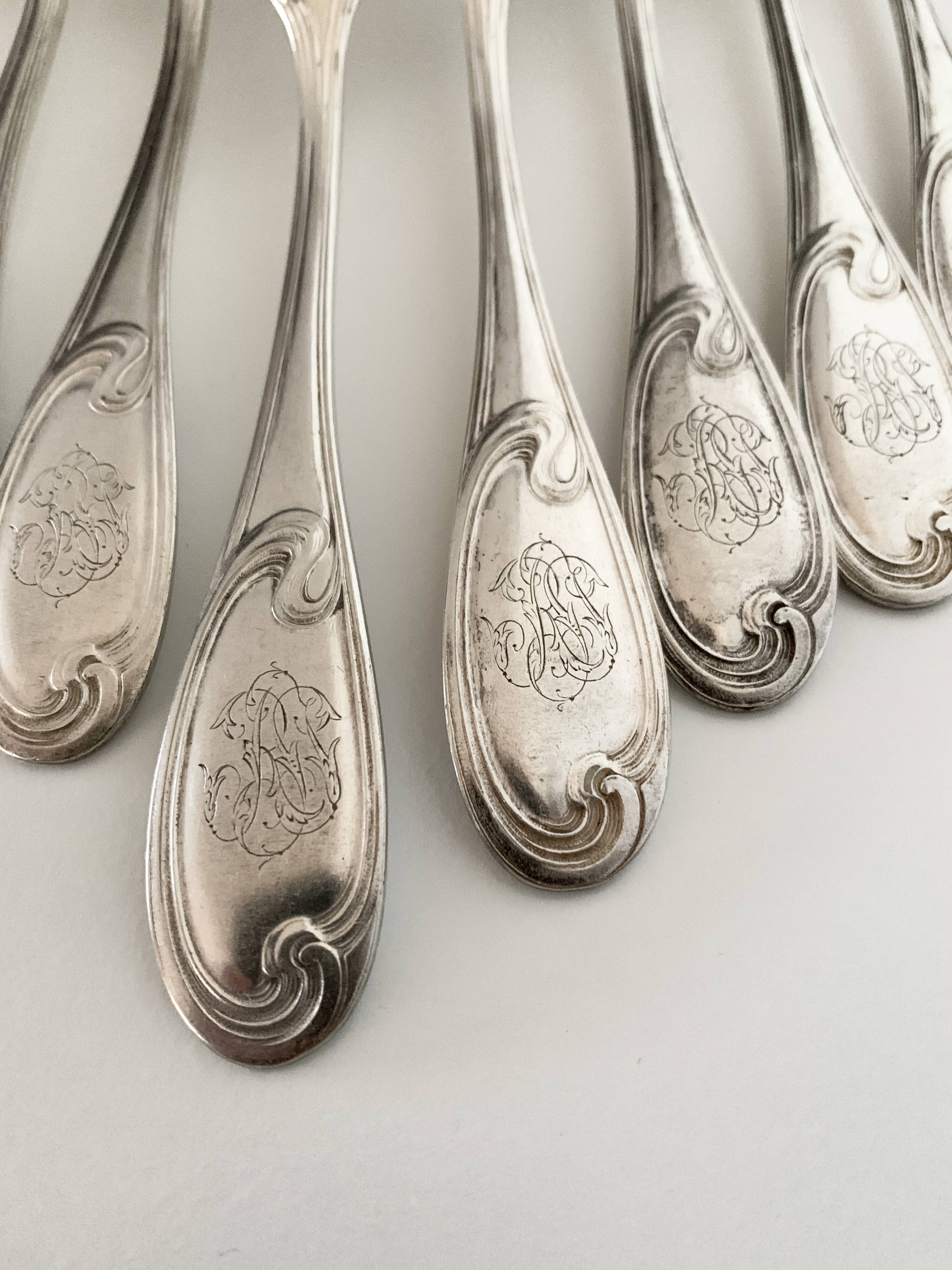 Nine large Ercuis silver-plated forks