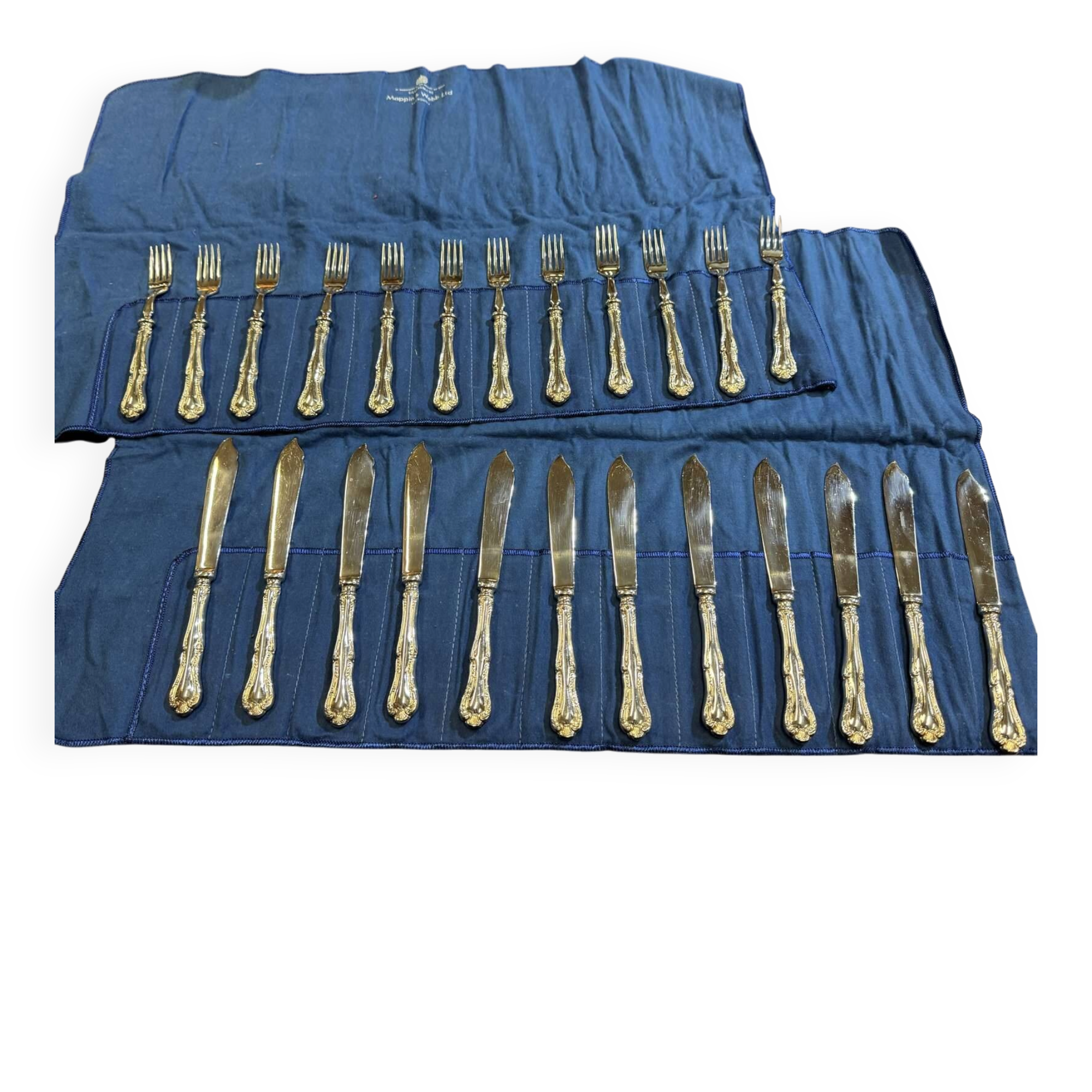 Service of 12 fish knives and 12 fish forks by Mappin and Webb.