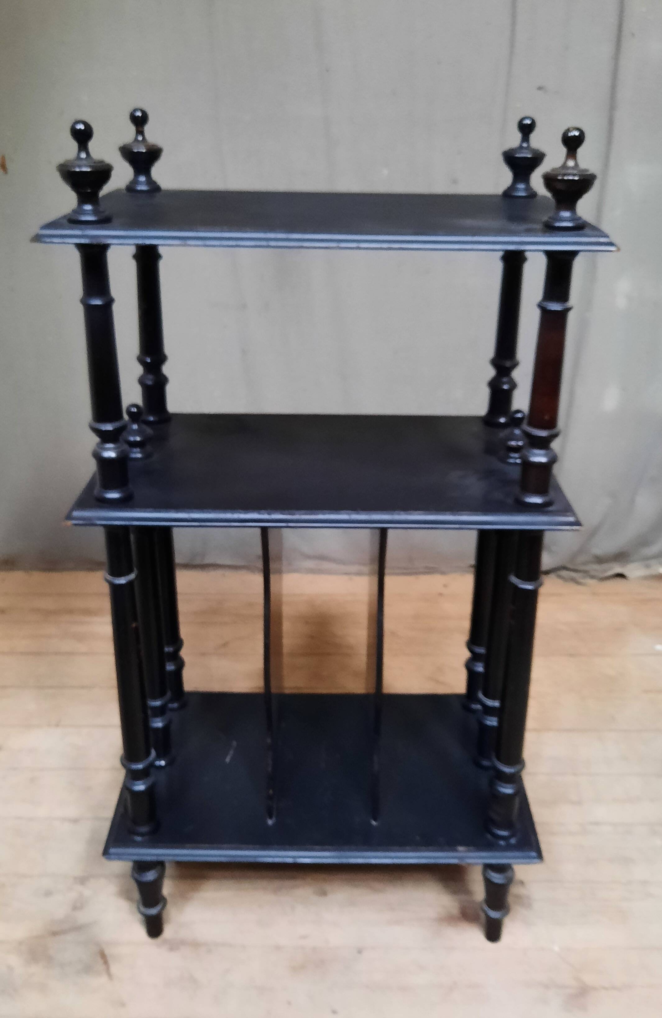 Blackened wooden shelf