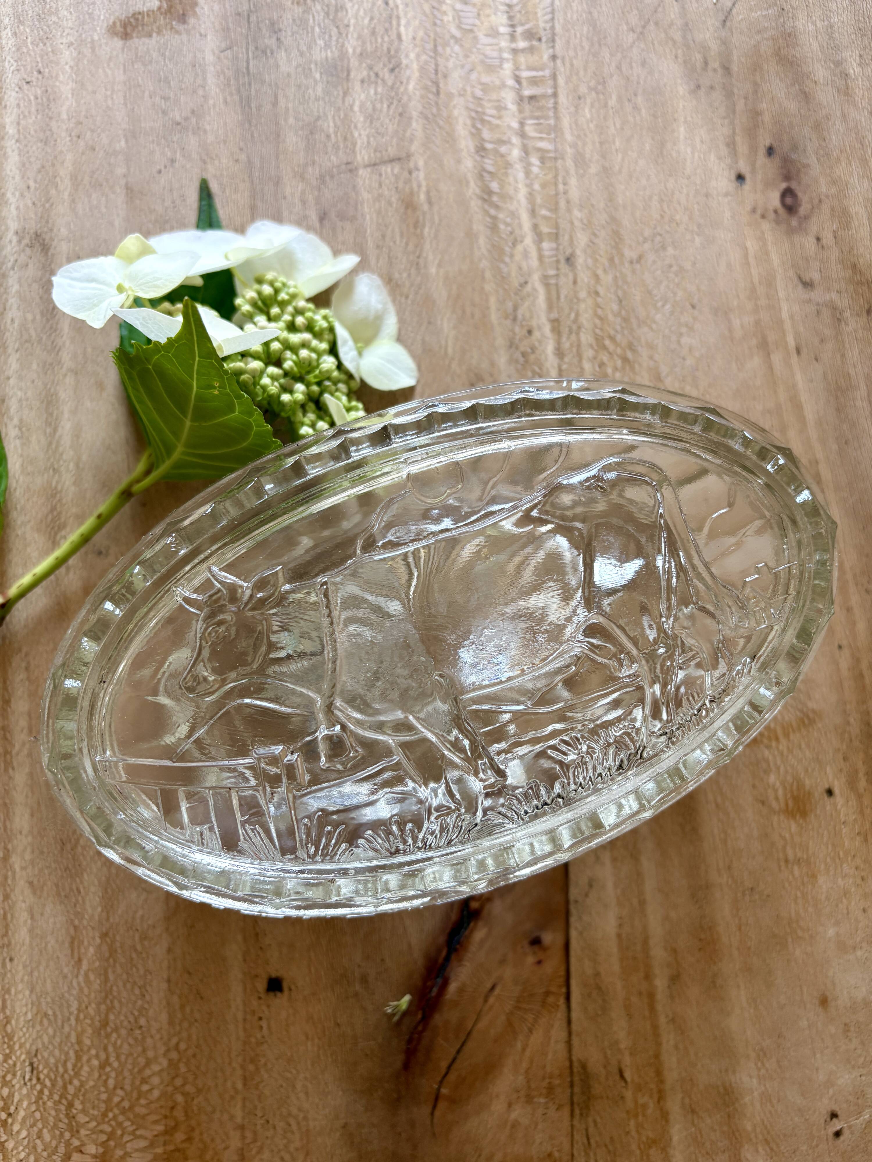 Vintage glass butter dish with cow decorations