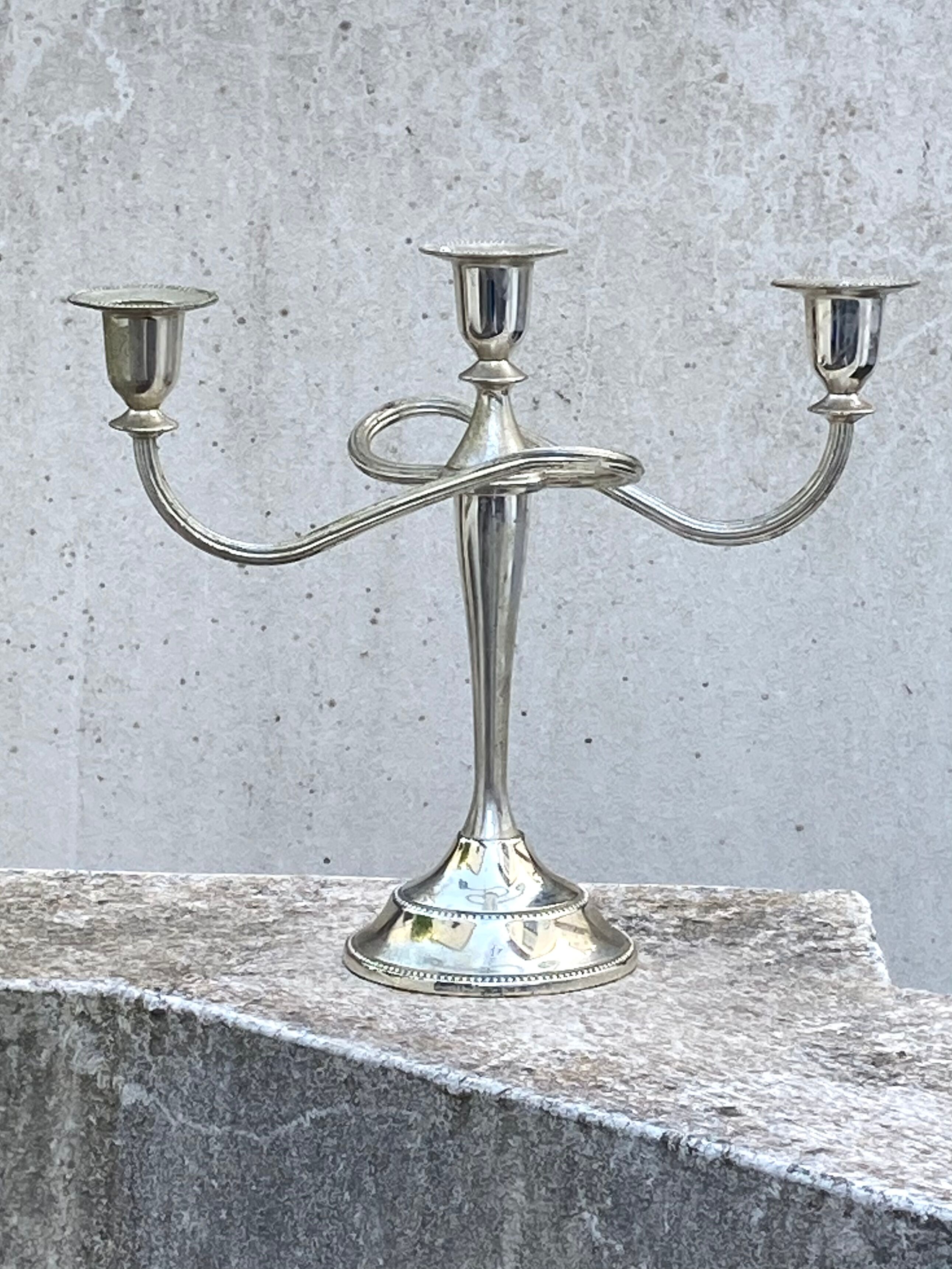 Ancient three-pointed candlestick