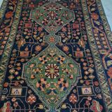 Old hand knotted kurdish woolen kolyai carpet. mid 20th century.